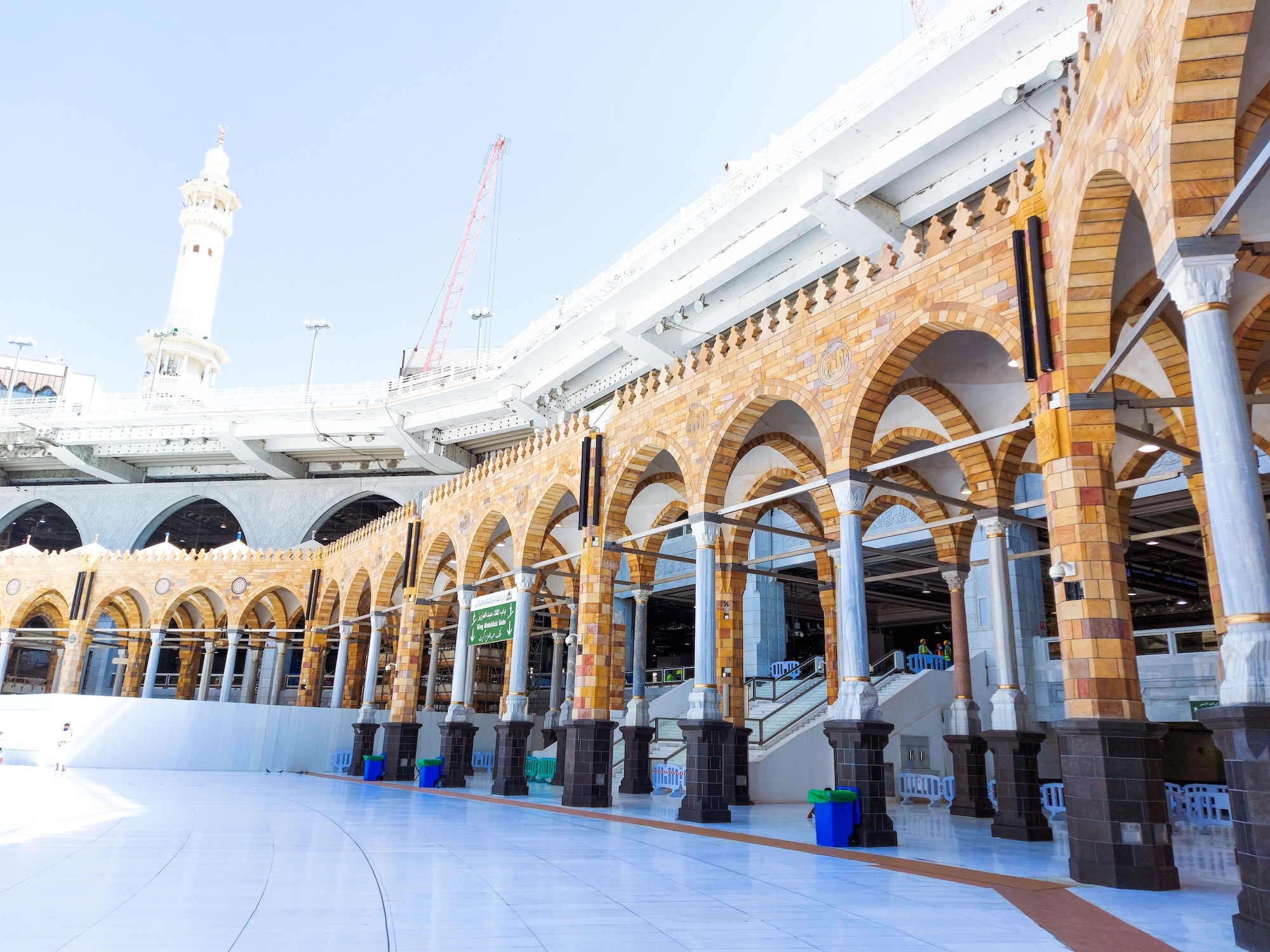 Pilgrims in Kaaba in Macca al Haram - umrah Covid 19 coronavirus restrictions face mask